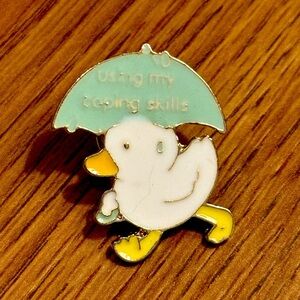 Women’s Accessories Cute White Duck Under MISPRINT on Blue Umbrella Enamel Pin